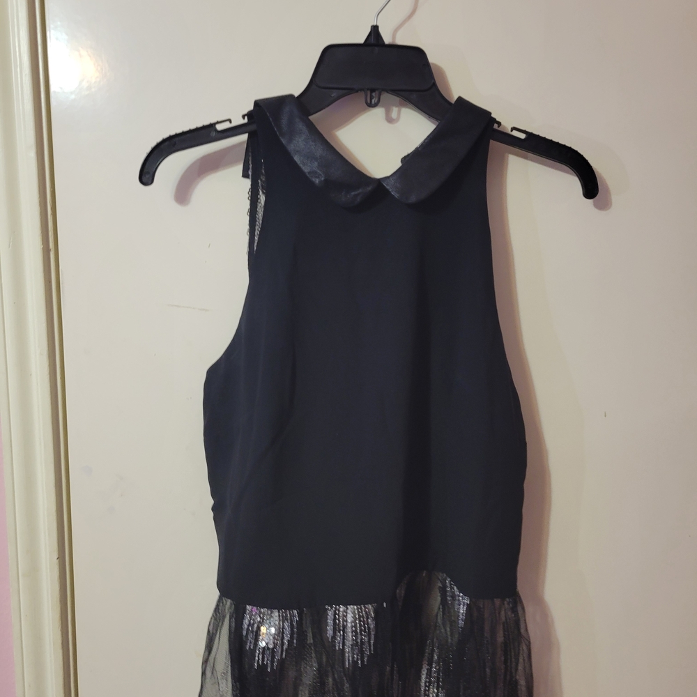 BCBG Black Sleeveless Blouse with Sheer Hem